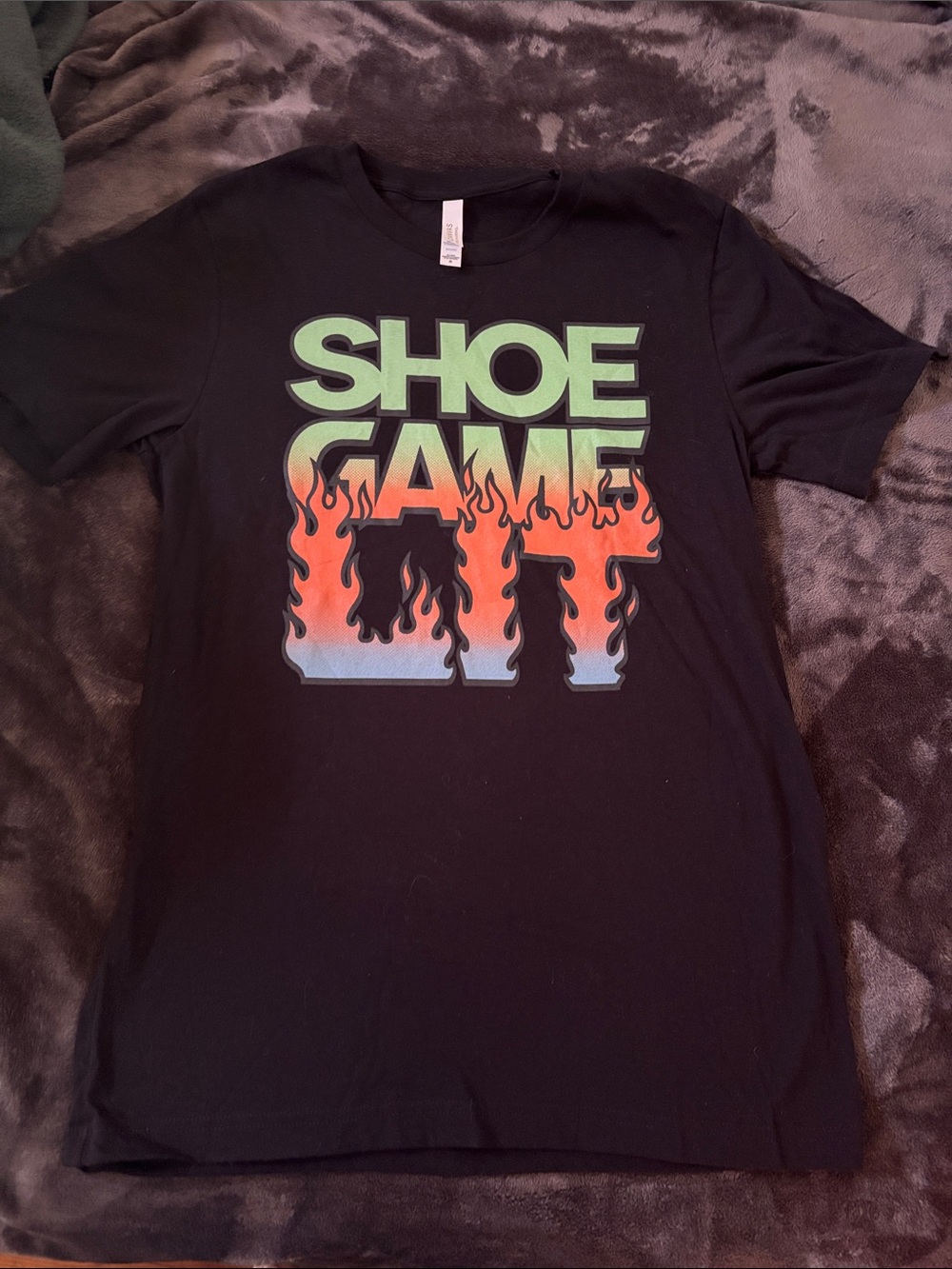 Bella Canvas Black Tee with Green Text & Orange Flame Graphic